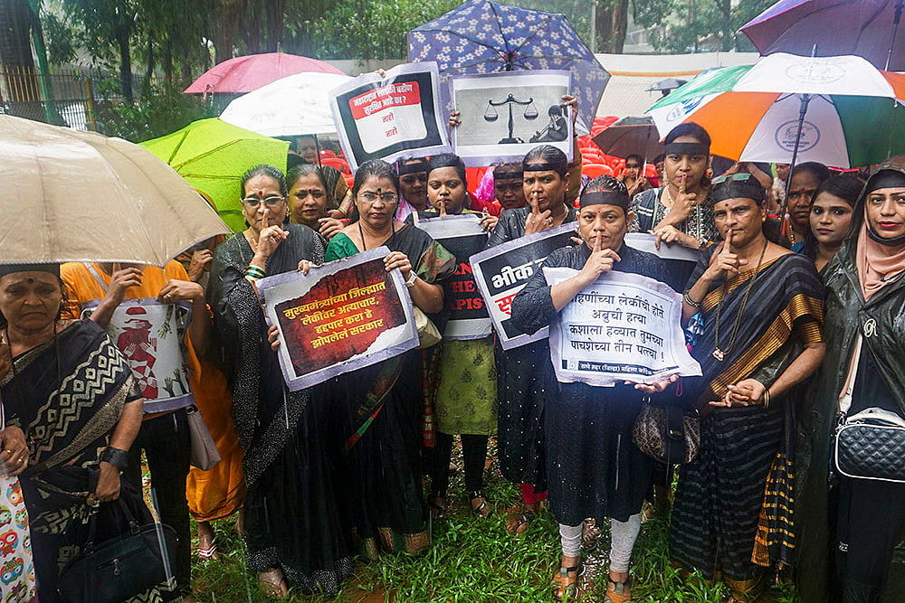 | Photo: PTI : Badlapur sexual assault case: Maha Vikas Aghadi (MVA) leaders and workers during a protest in Thane